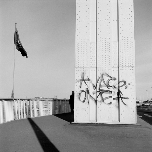 Figure in shadows on Liberty Bridge, Budapest